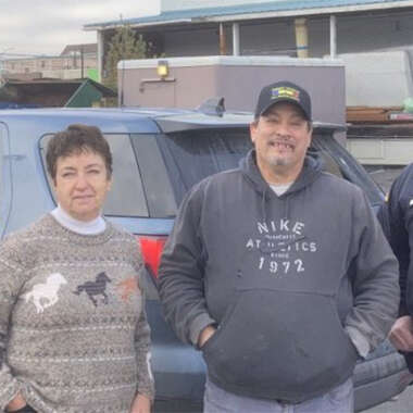 Sergeant Moore, Trooper Bryant, and Secretary Supervisor Jordan delivering donations to an area shelter.